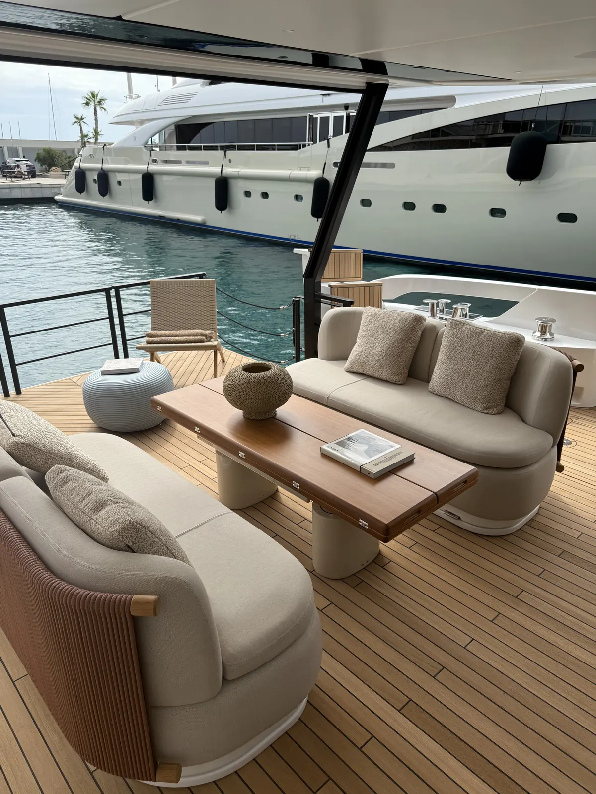 Stern lounge area prepared for a welcome aperitivo aboard Aqualis